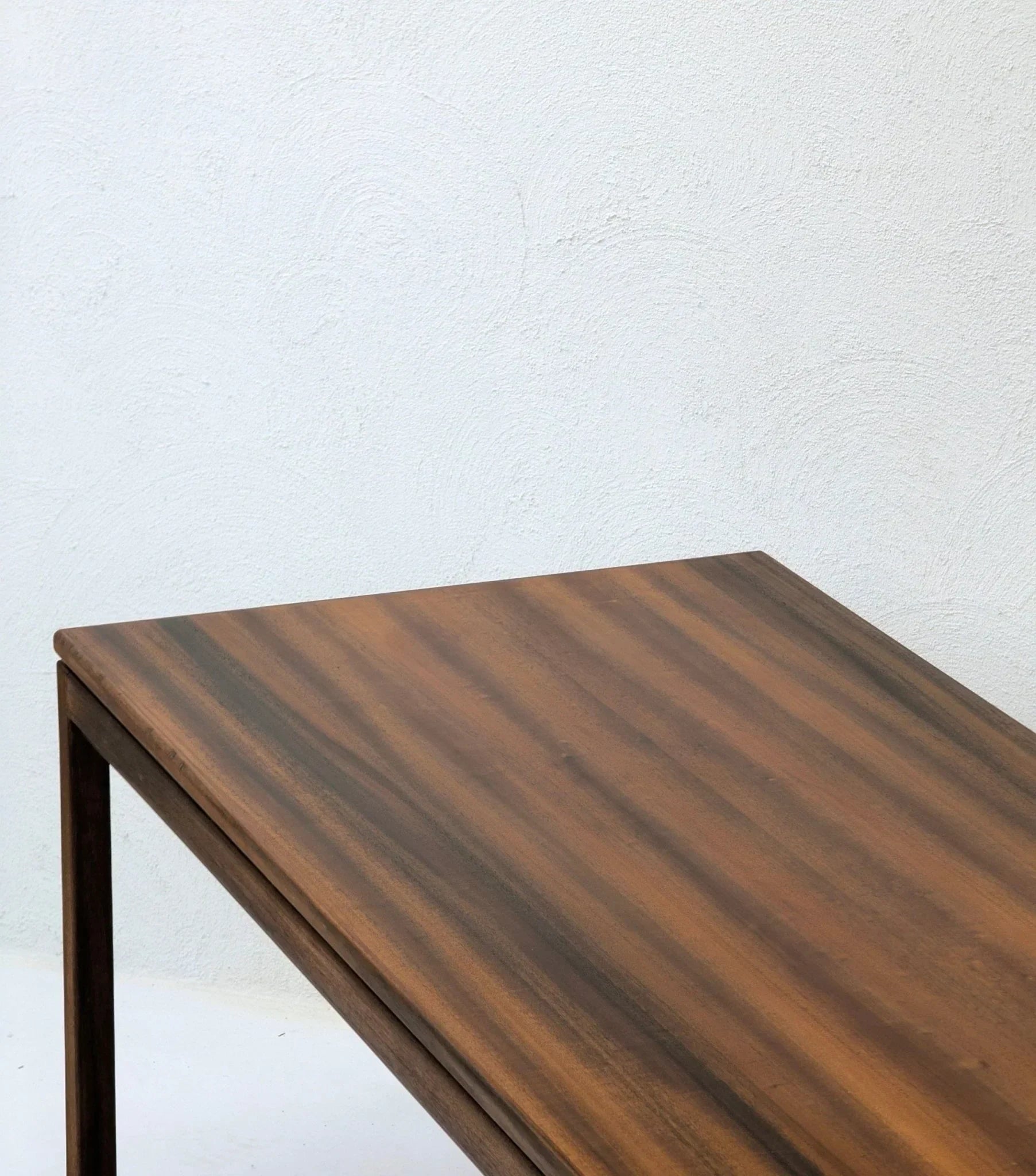 1960s vintage rectangular wood coffee table with striped grain against white wall
