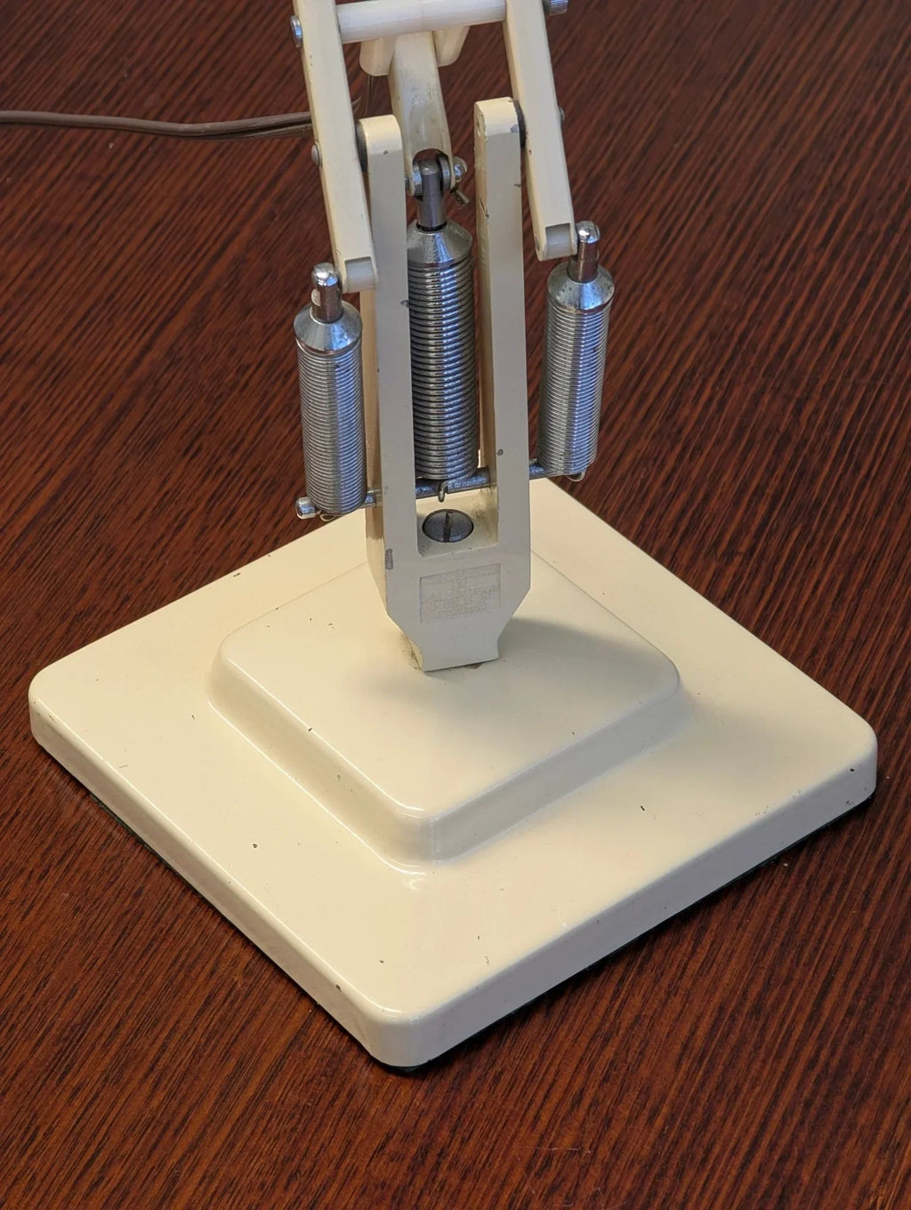 1960s Herbert Terry Model 1227 Anglepoise desk lamp base with springs on wood table