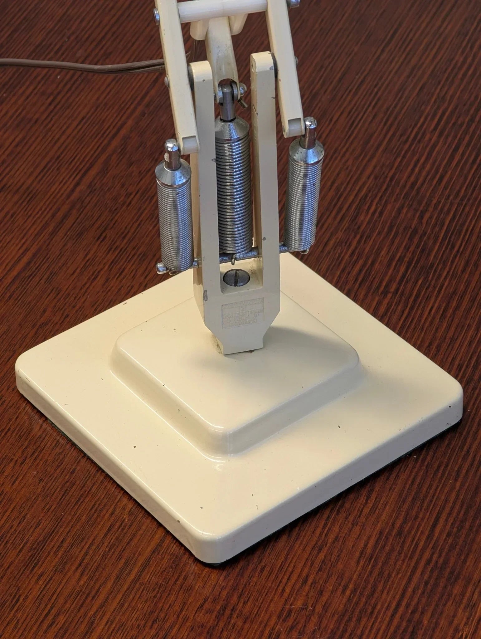 1960s Herbert Terry Model 1227 Anglepoise desk lamp base with springs on wood table