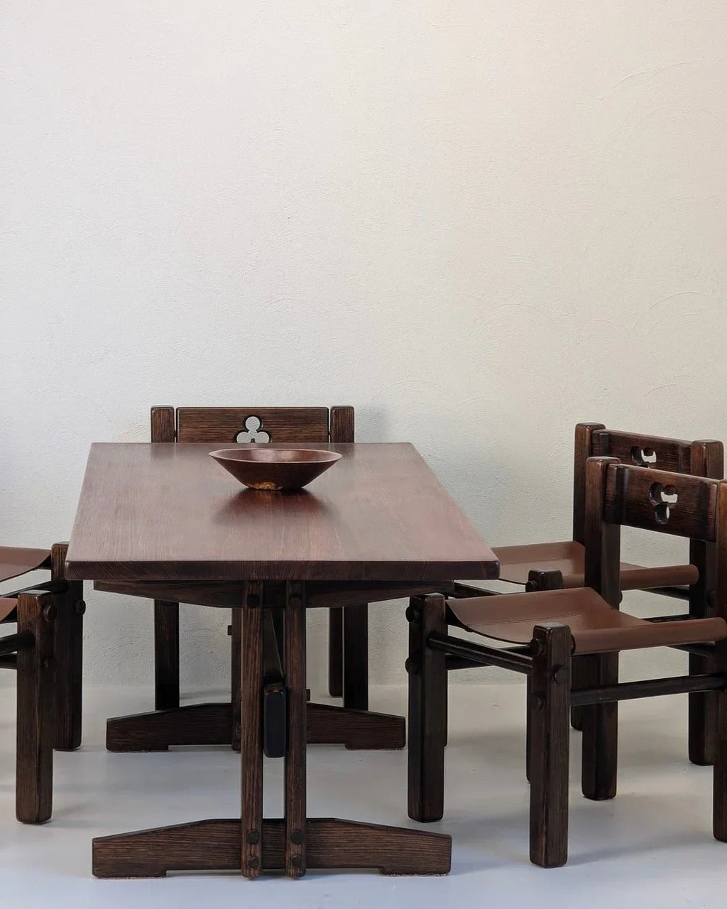 1970s Alpine Ash dining table with matching wood chairs, minimalist setting, mid-century modern style