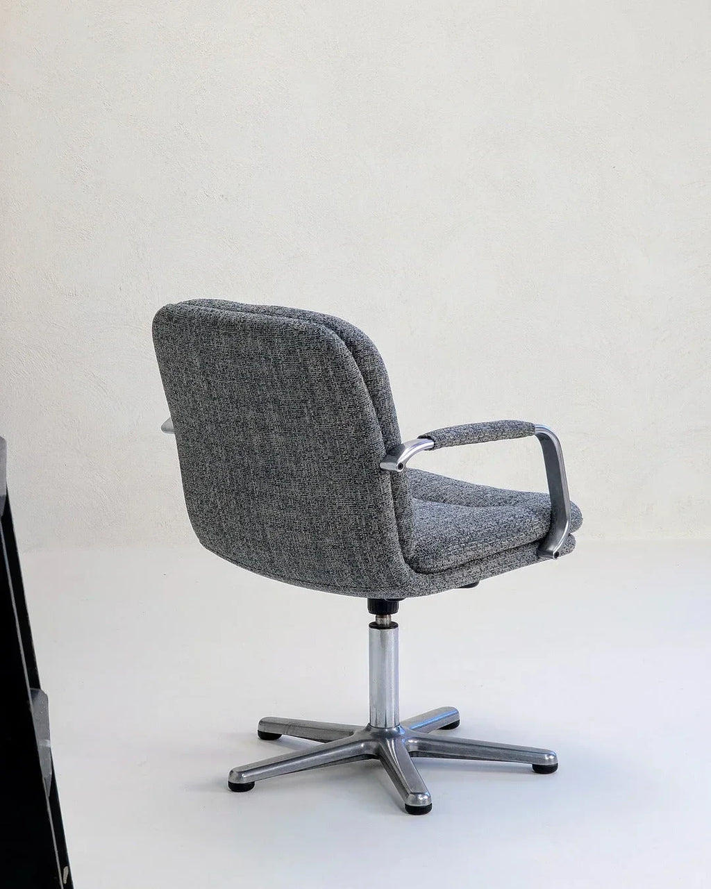 80s executive swivel armchair in textured grey wool with metal arms and base