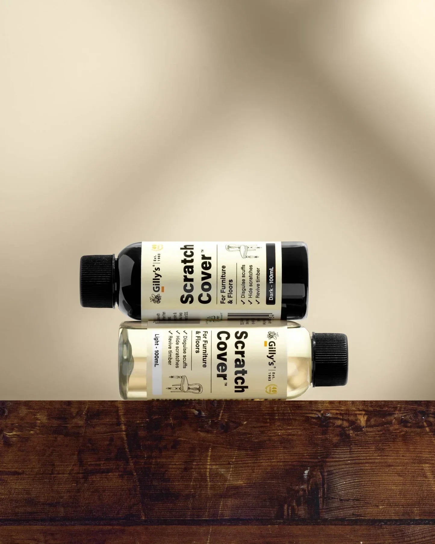 Gilly's Scratch Cover bottles for furniture and floors on wood surface