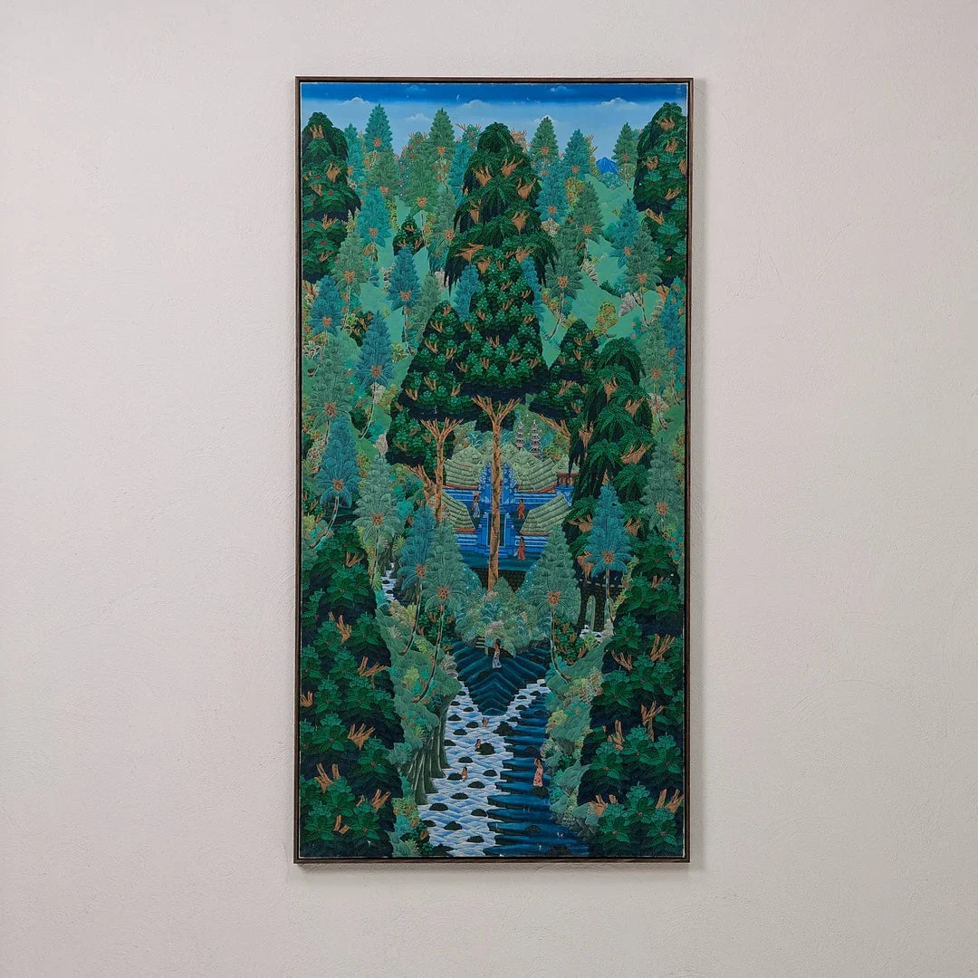 Framed painting of a lush forest with tall trees, a winding river, and small human figures
