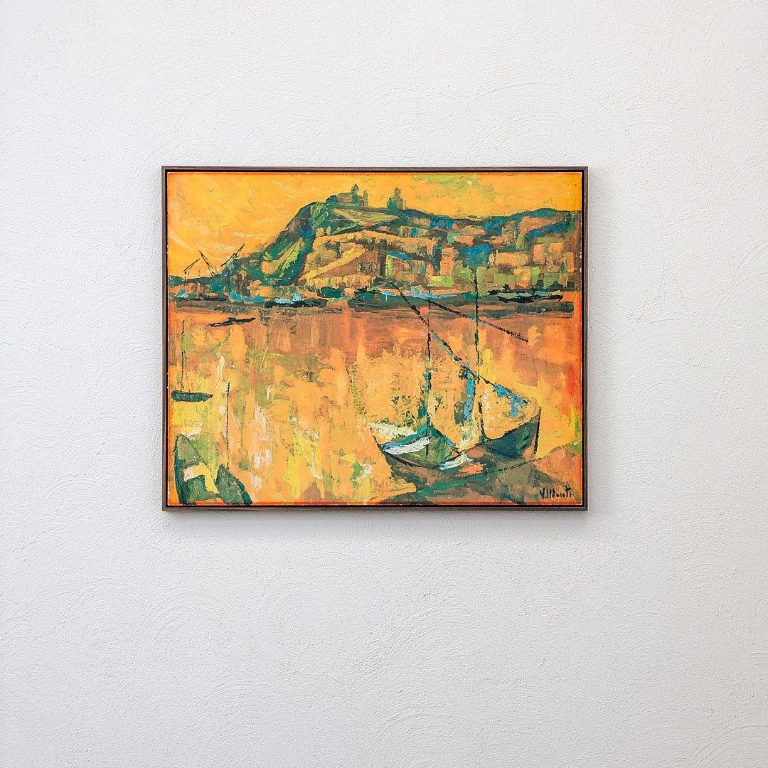 Framed abstract painting of boats on water with a mountainous background in warm orange and green tones