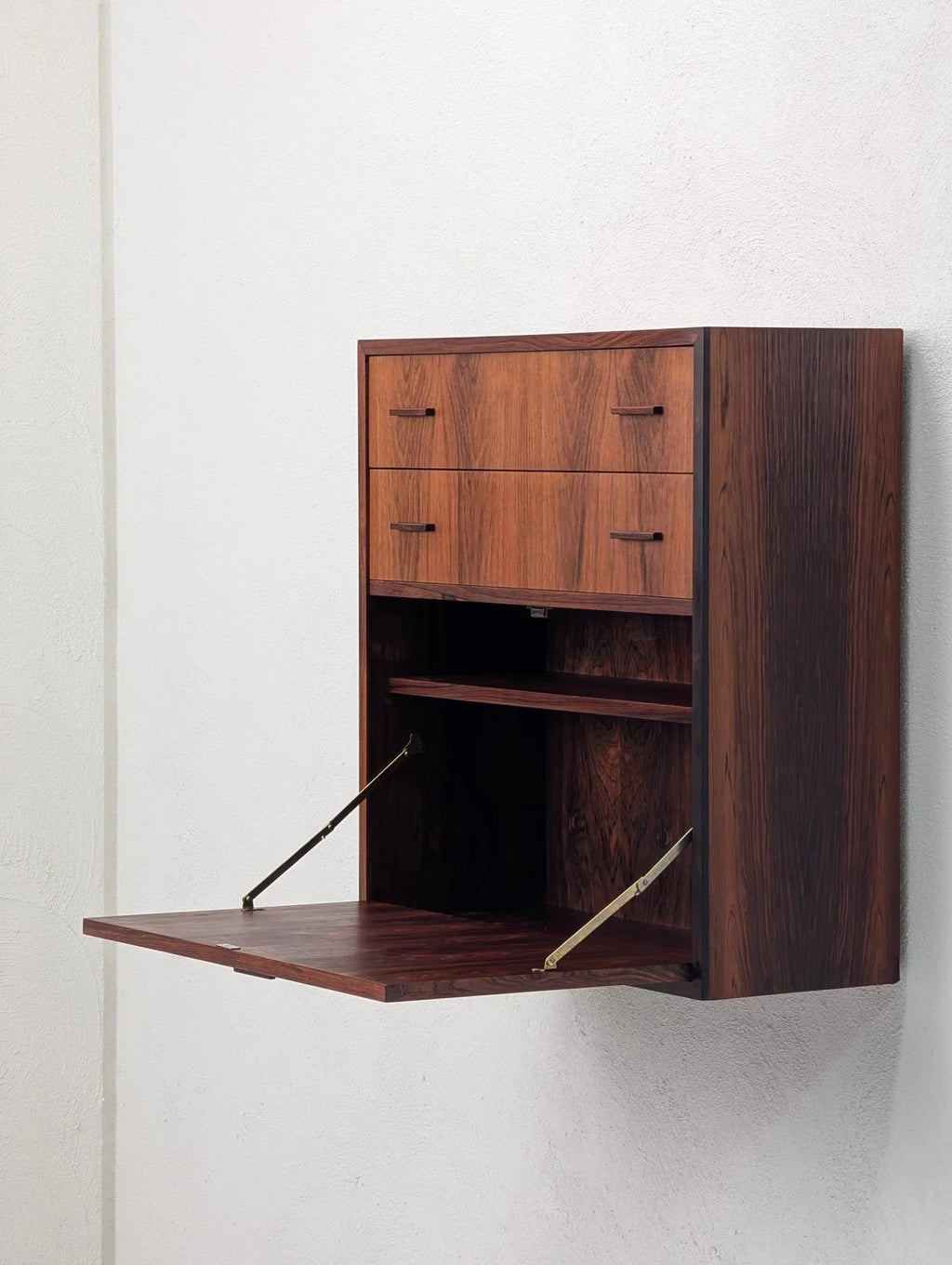 Danish modern floating rosewood cabinet with drop-down desk, mid-century design