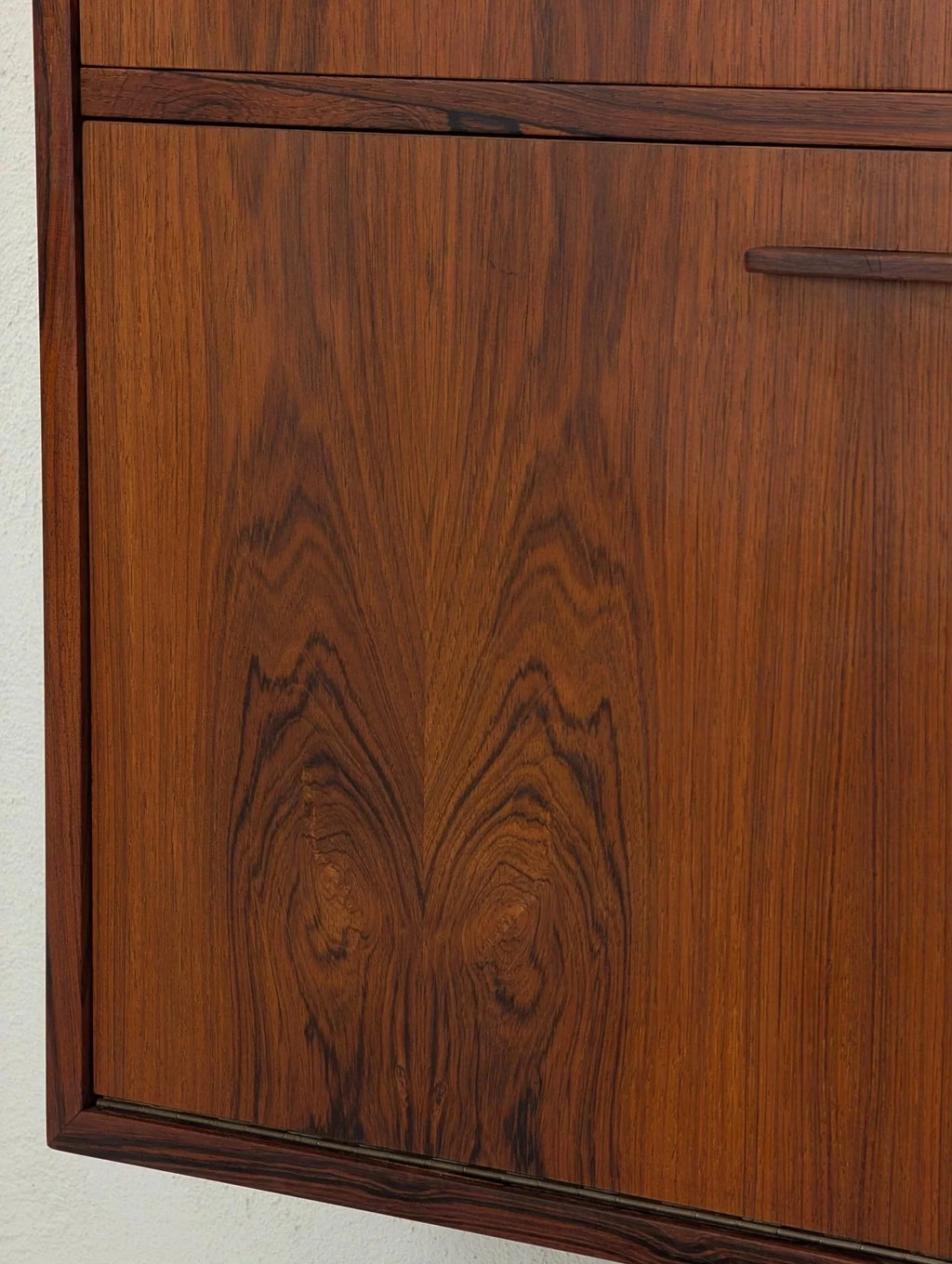 Danish modern floating cabinet in book-matched rosewood, close-up of wood grain