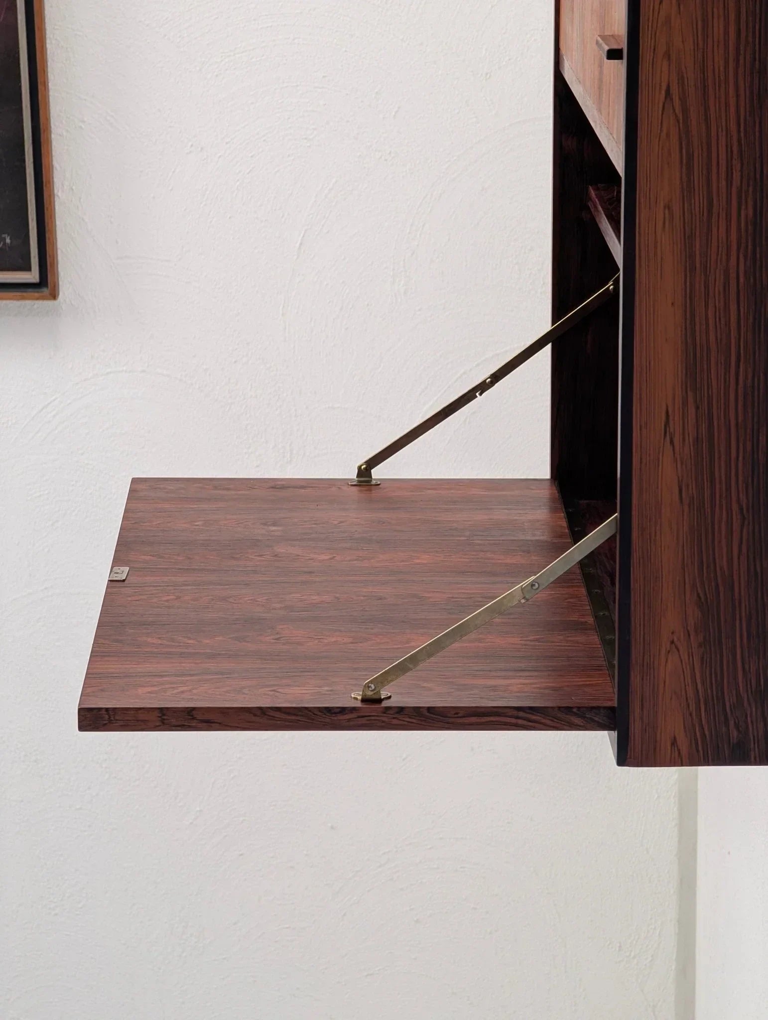 Danish modern floating cabinet in book-matched rosewood with drop-down door, 1960s