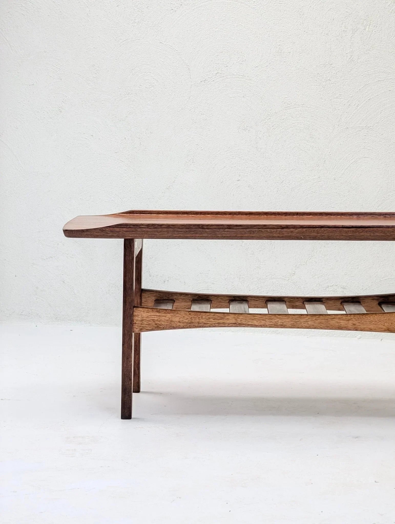 Mid-century Italian solid teak tray top coffee table with slatted lower shelf, minimalist style