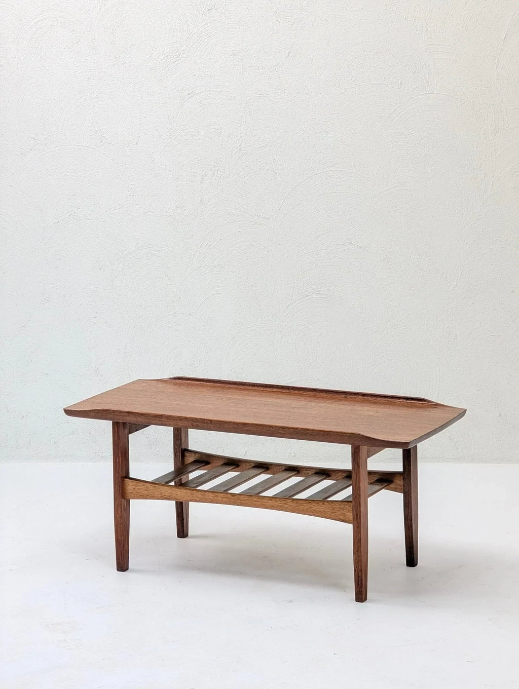 Italian solid teak tray top coffee table with slatted shelf, mid-century modern design