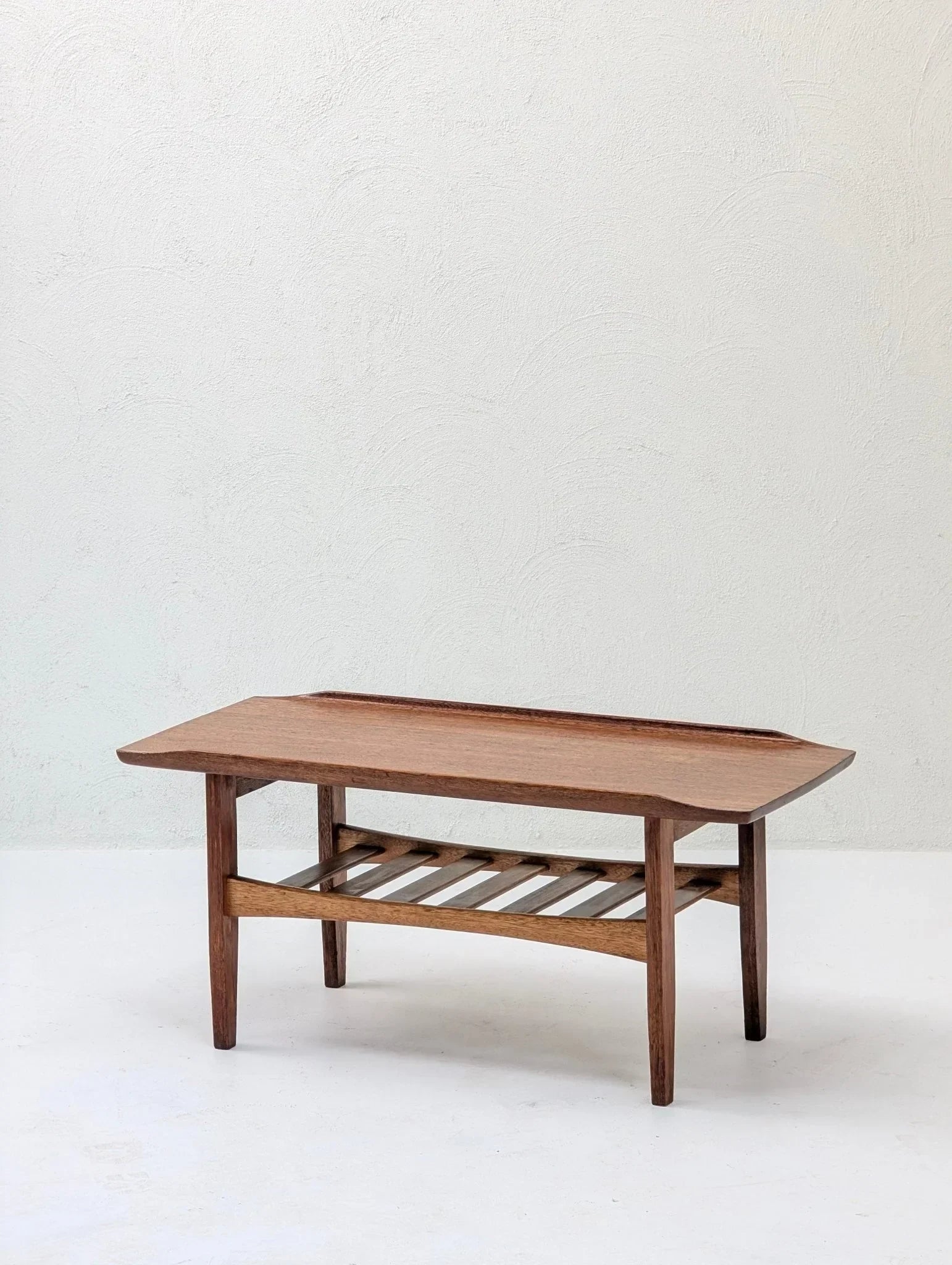 Italian solid teak tray top coffee table with slatted shelf, mid-century modern design