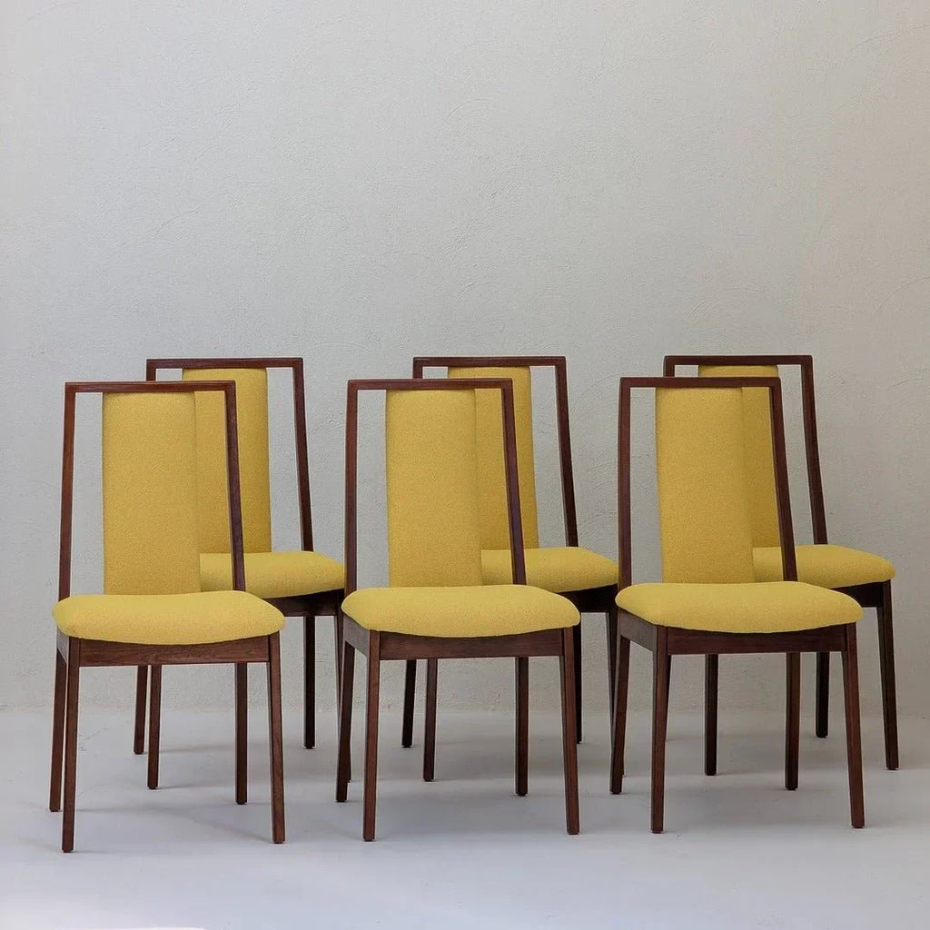 Set of six mid-century modern dining chairs with yellow upholstery and wooden frames