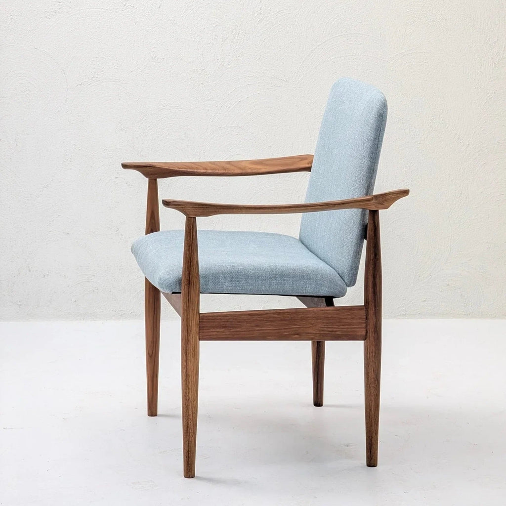 Mid-century modern sculptural armchair with teak and blackwood frame, blue upholstery