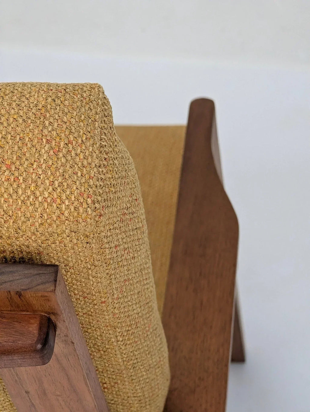 Mid-century modern solid teak lounge chair with textured mustard upholstery