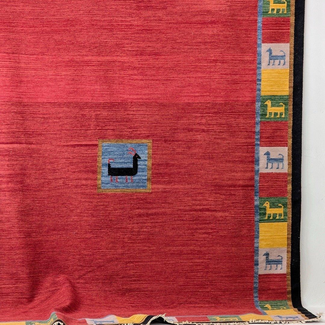 Monumental Vintage Persian Qashqai Gabbeh Rug with Animal Motifs in Madder Red, Circa 1970 - Fox & Wedge