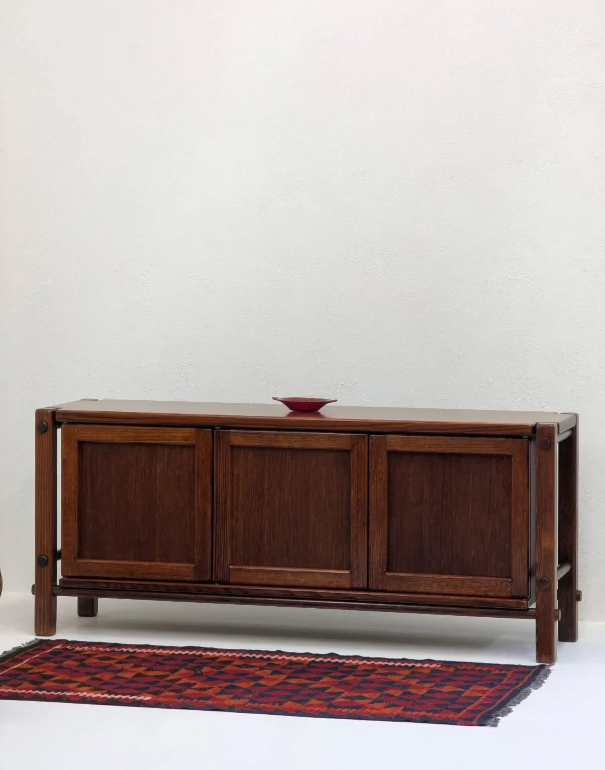 Mid-century solid Victorian alpine ash sideboard with red bowl and patterned rug