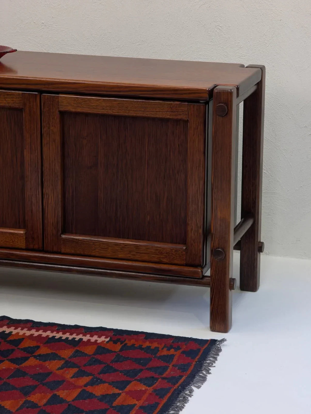 Mid-century solid Victorian alpine ash sideboard with geometric rug on white floor
