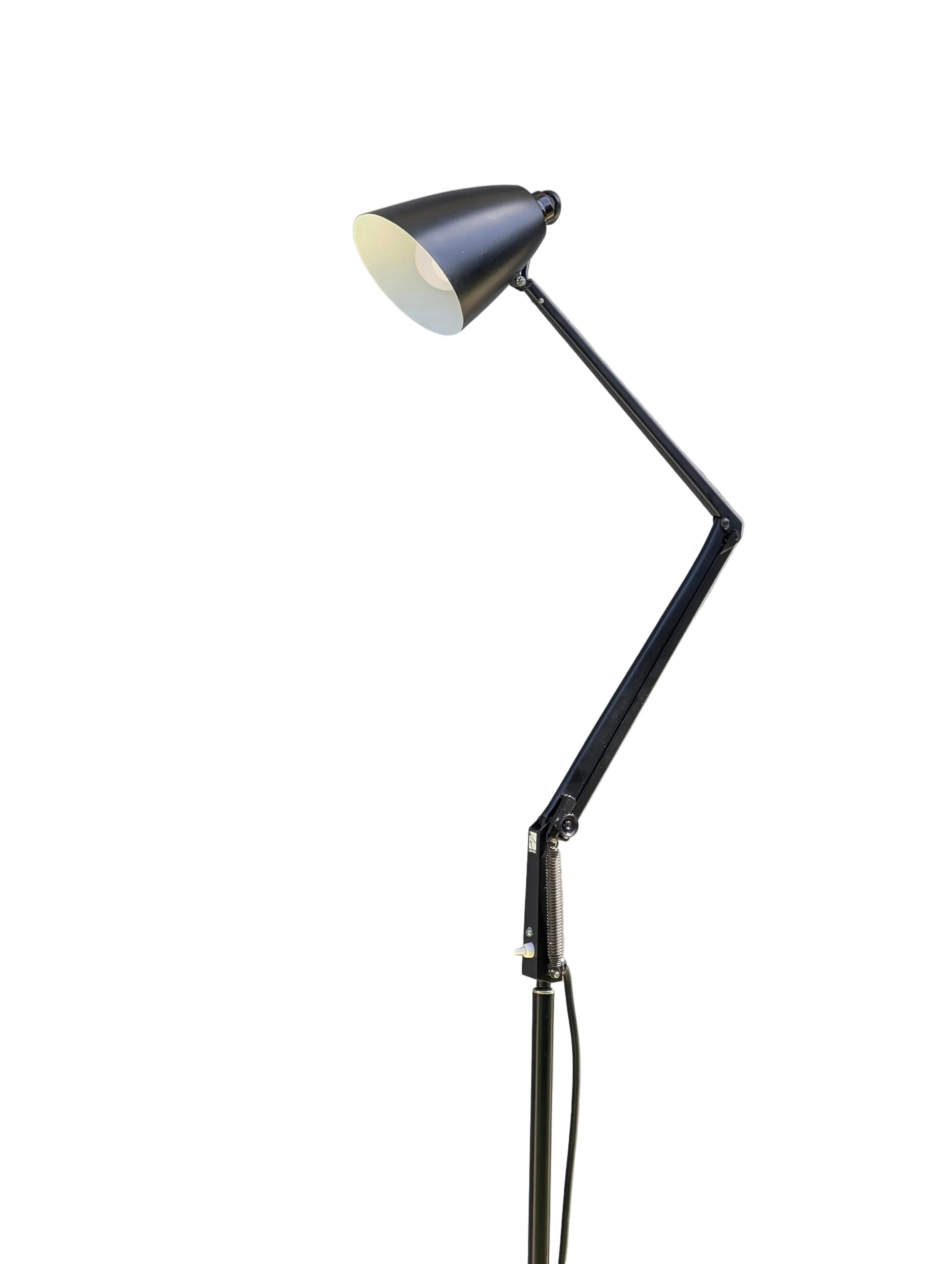 Adjustable black floor lamp with angled arm and conical shade on white background