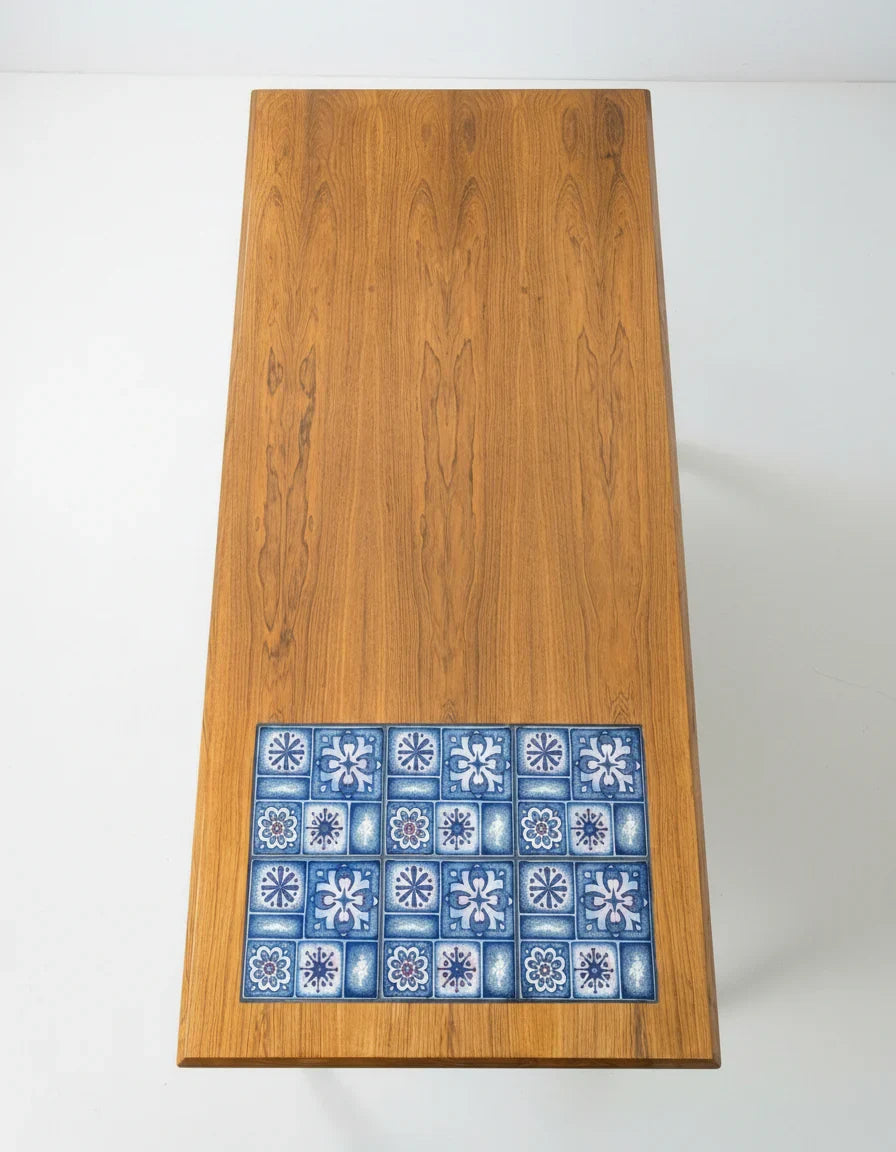 Rectangular wood coffee table with blue patterned ceramic tile inlay, minimalist style