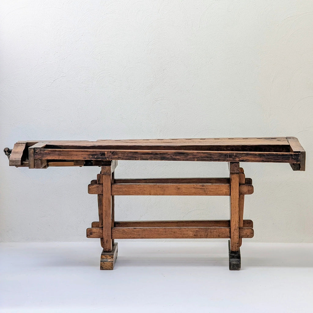Antique wooden workbench on white background, rustic vintage woodworking table