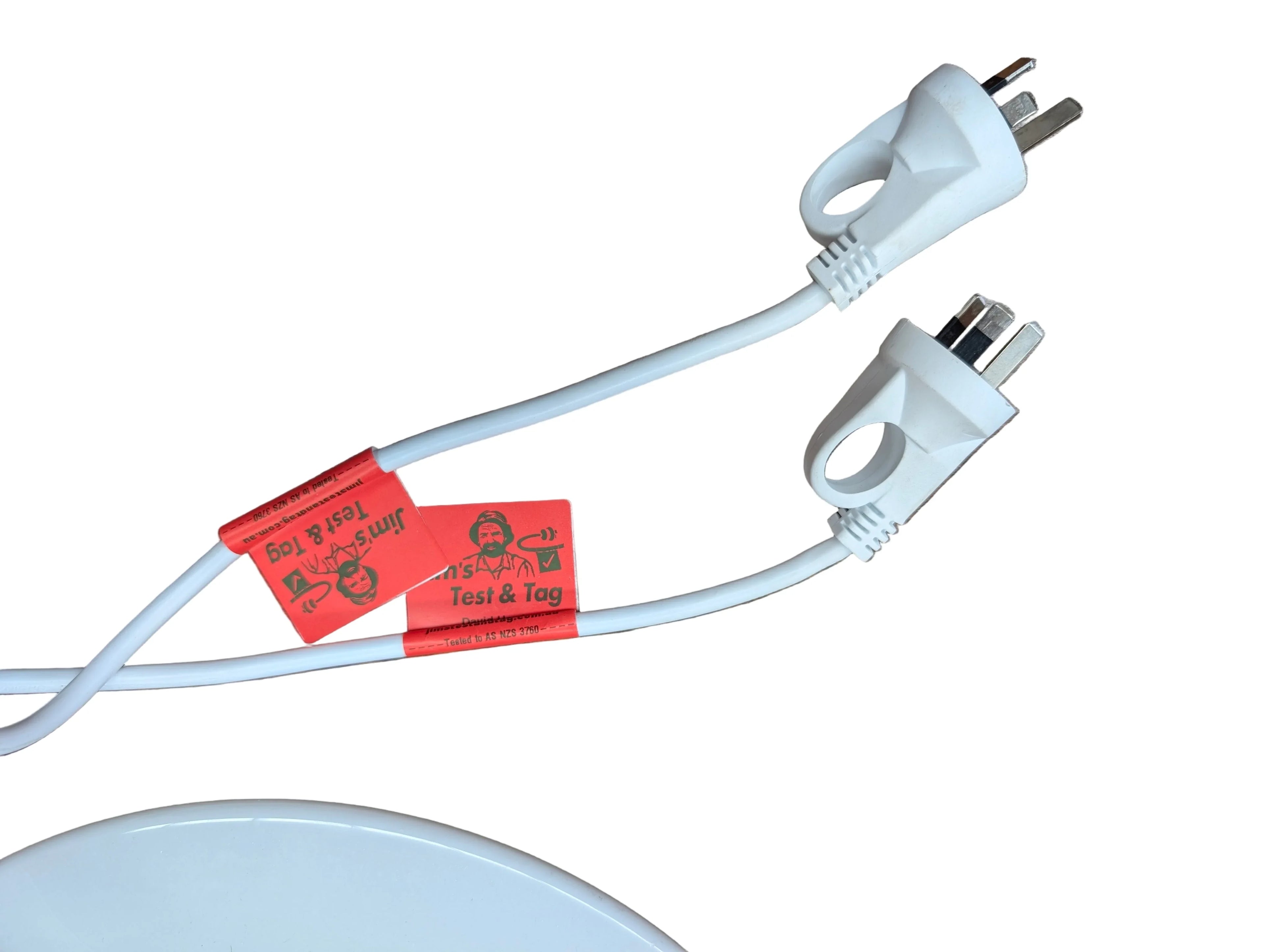 White Australian power plug extension cord with red Test & Tag safety labels on plain white background