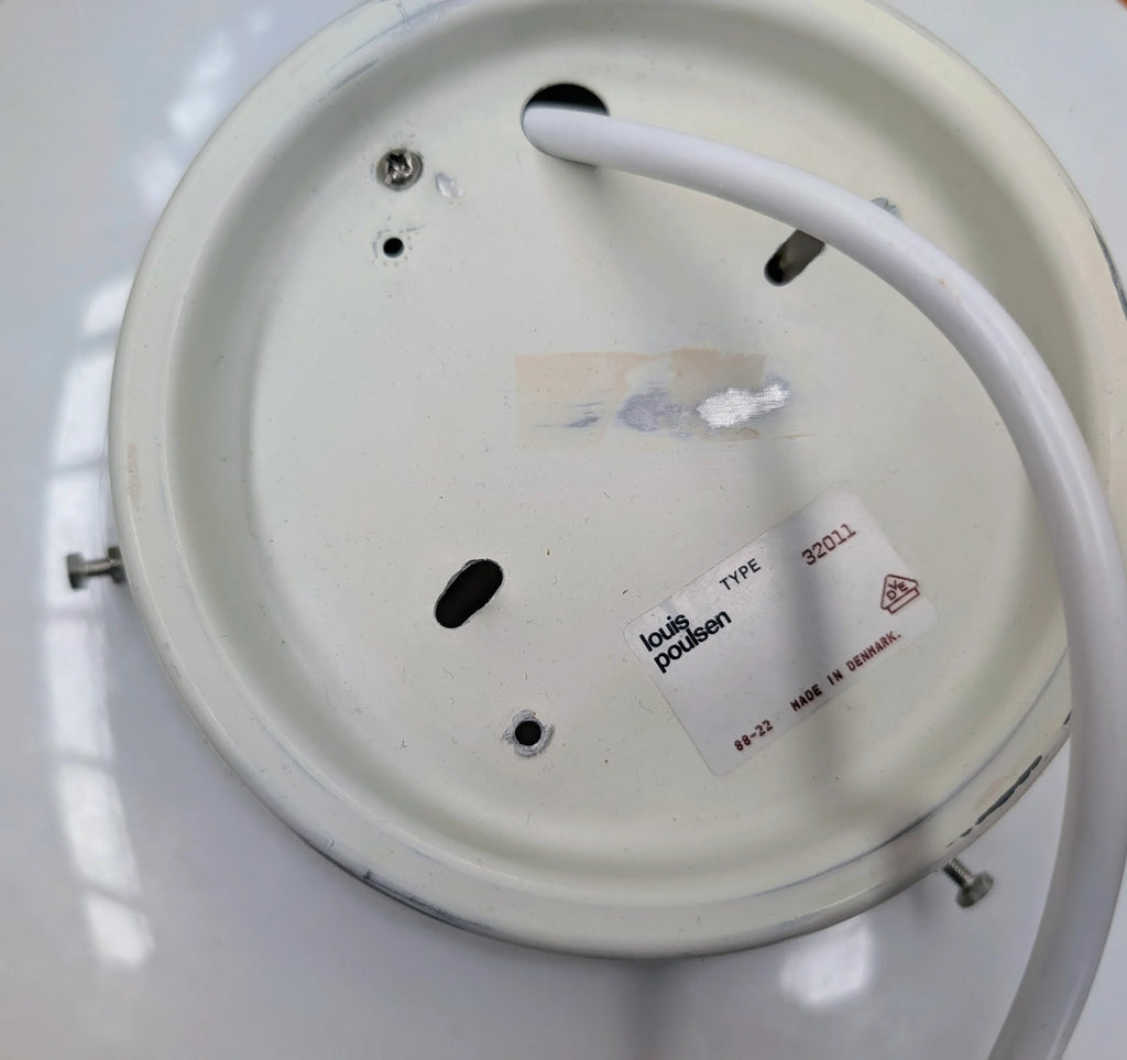 White circular metal base of Louis Poulsen lamp with cable and label, type 32011, made in Denmark