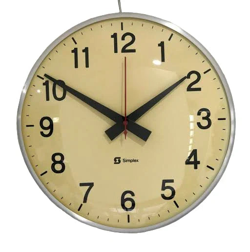 Simplex round wall clock with beige face, black numbers, and hands showing 10:10