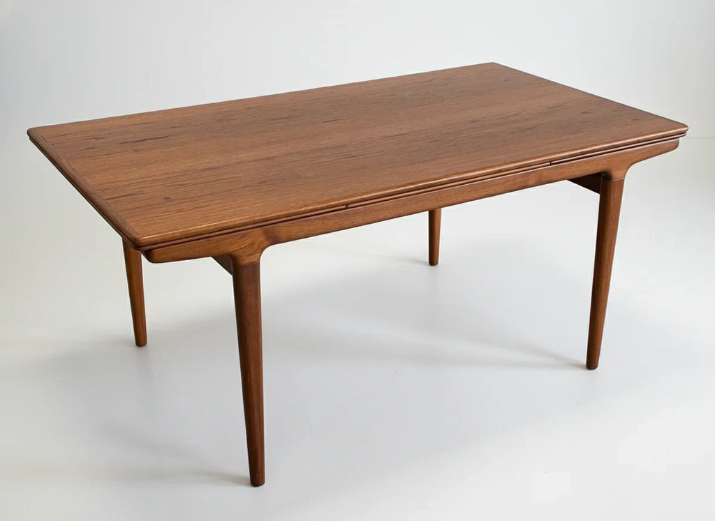 Minimalist wooden coffee table with tapered legs and smooth rectangular tabletop