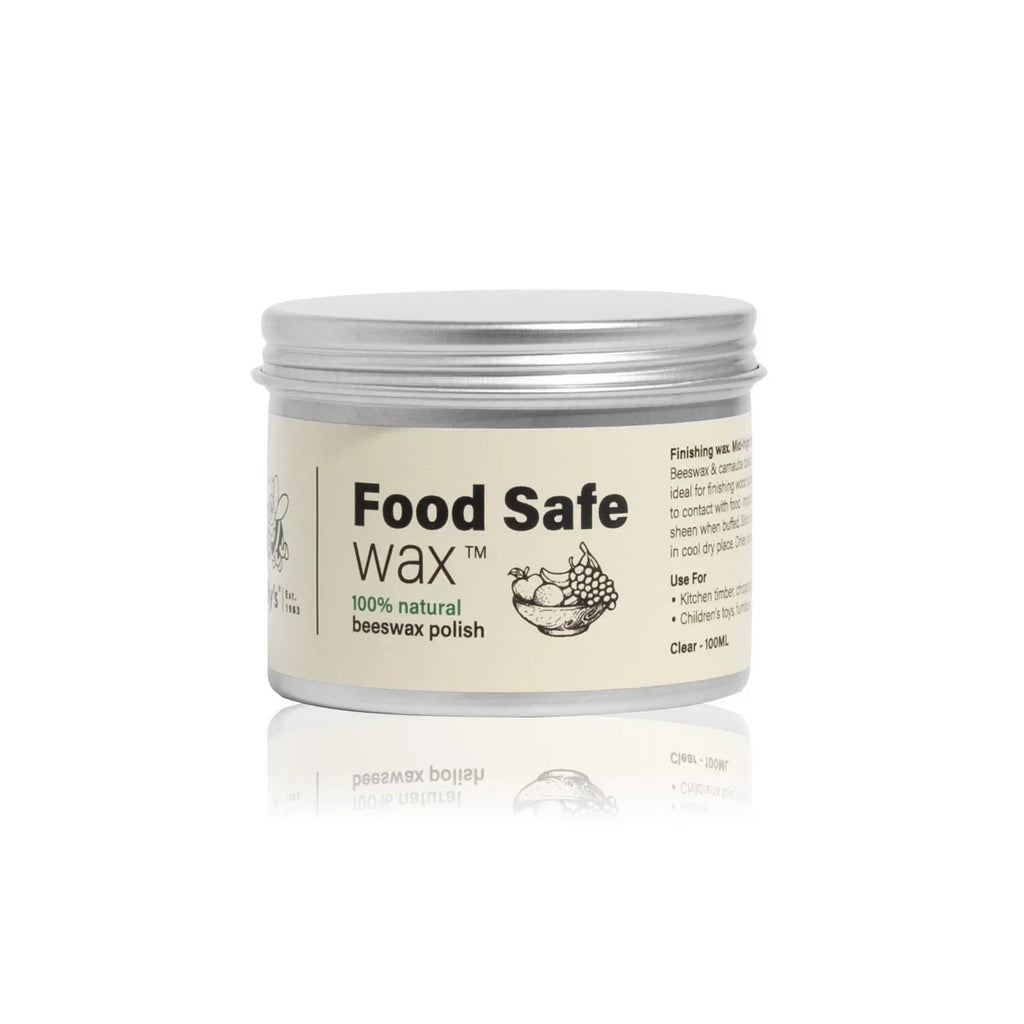 Food safe wax tin, 100% natural beeswax polish, silver container on white background