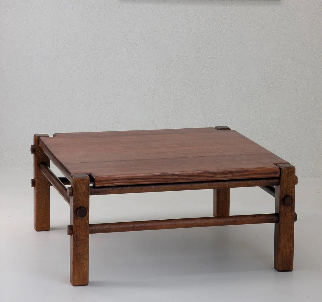 Mid-century modern low square wooden coffee table with sturdy legs and clean lines, vintage style