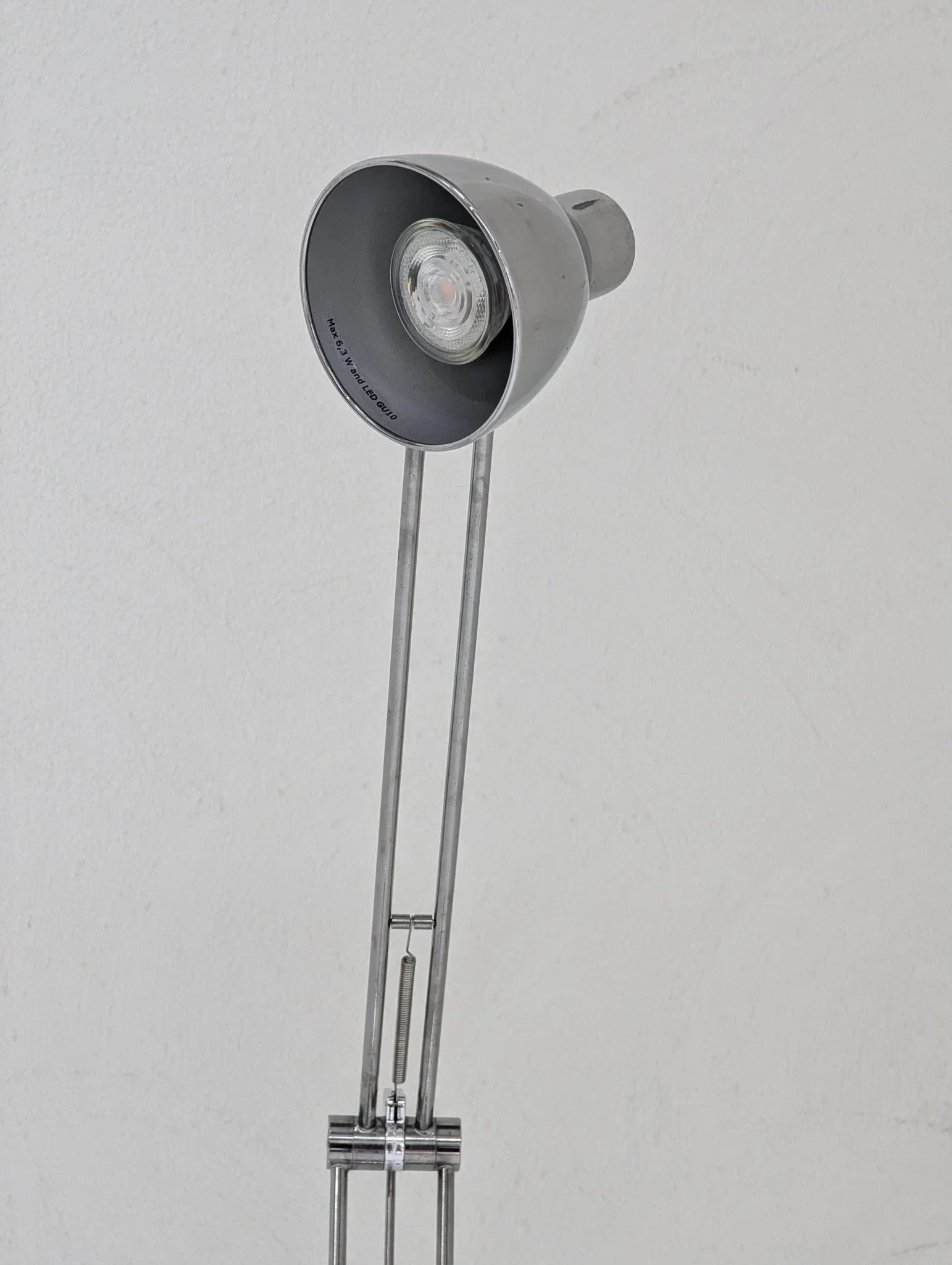 Vintage IKEA Antifoni floor lamp with adjustable chrome arm and gray metal shade.